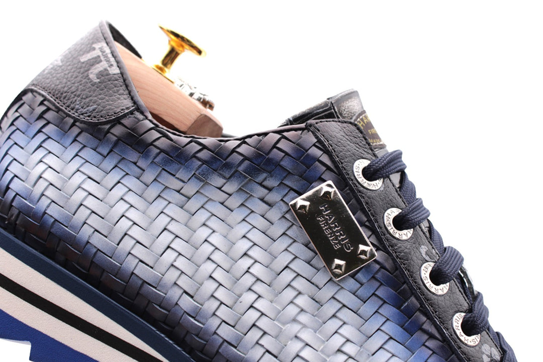 Hand -shaped woven leather sneakers