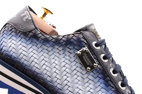 Hand -shaped woven leather sneakers