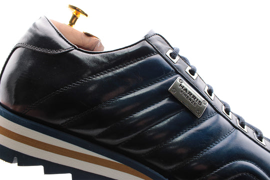 Leder -Turnschuhe