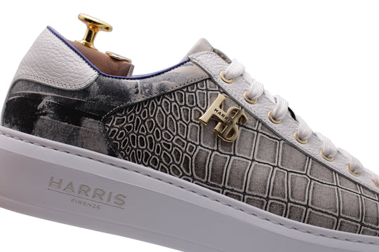 Sneakers in printed leather with a rubber sole.