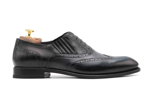 Slip-On Oxford mit Brogue-Verzierungen