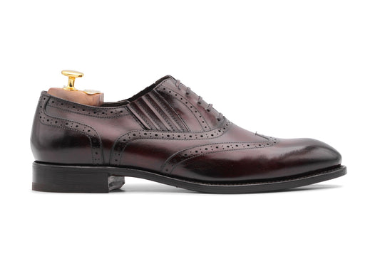 Slip-On Oxford mit Brogue-Verzierungen