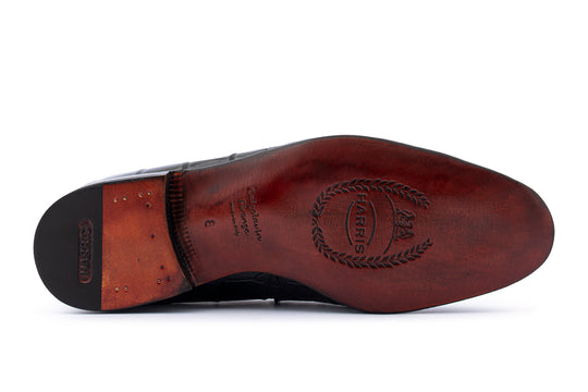 Alligator moccasin with metal loop