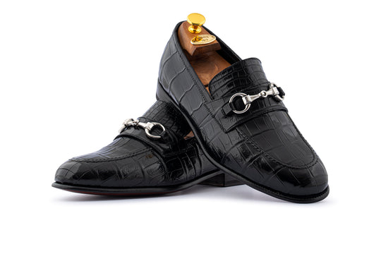 Alligator moccasin with metal loop