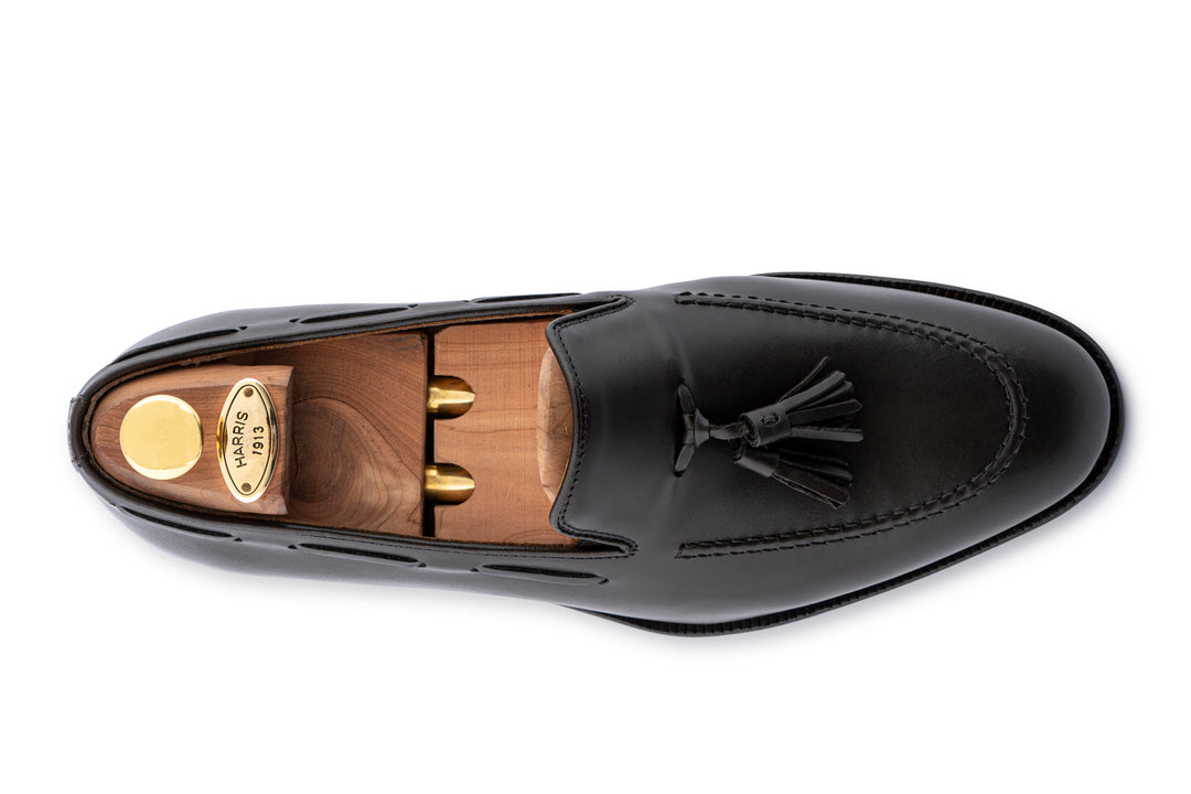 Mocassino in pelle con pon pon