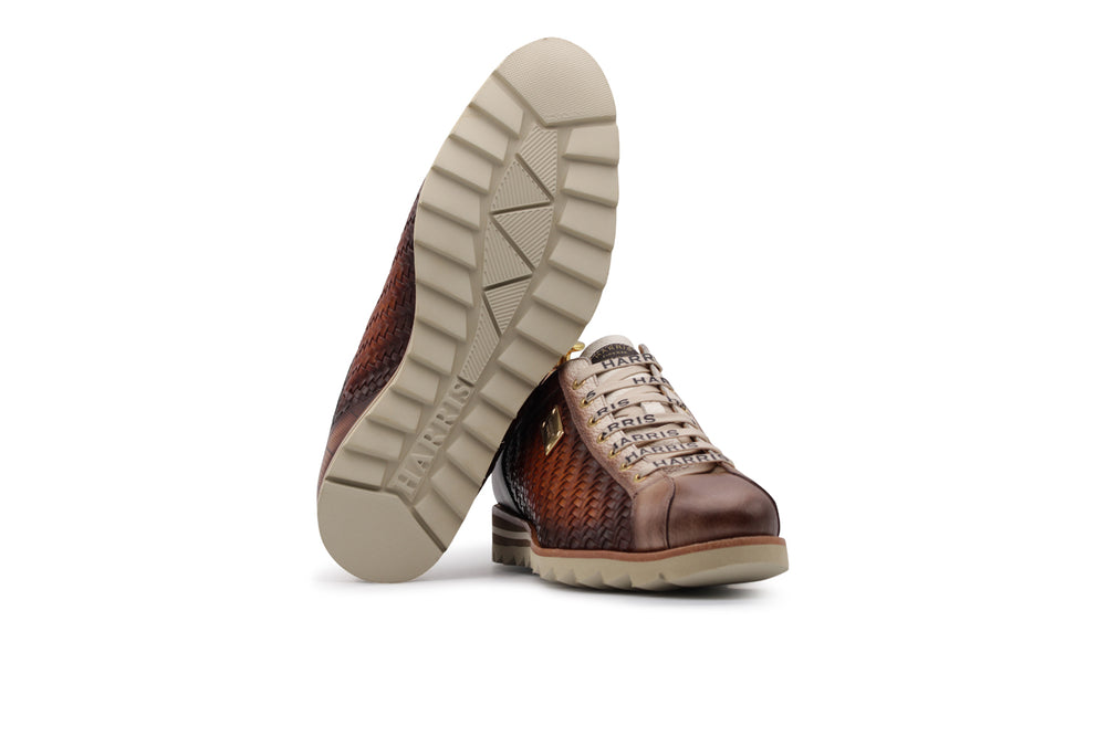 Sneakers in pelle intrecciata sfumata a mano