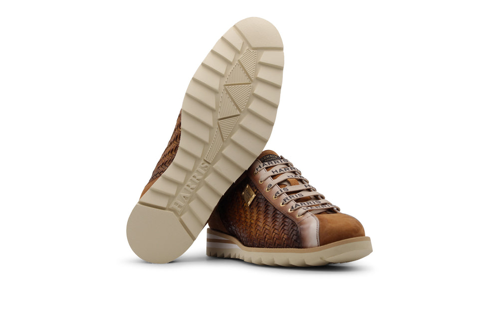 Sneakers in pelle intrecciata sfumata a mano