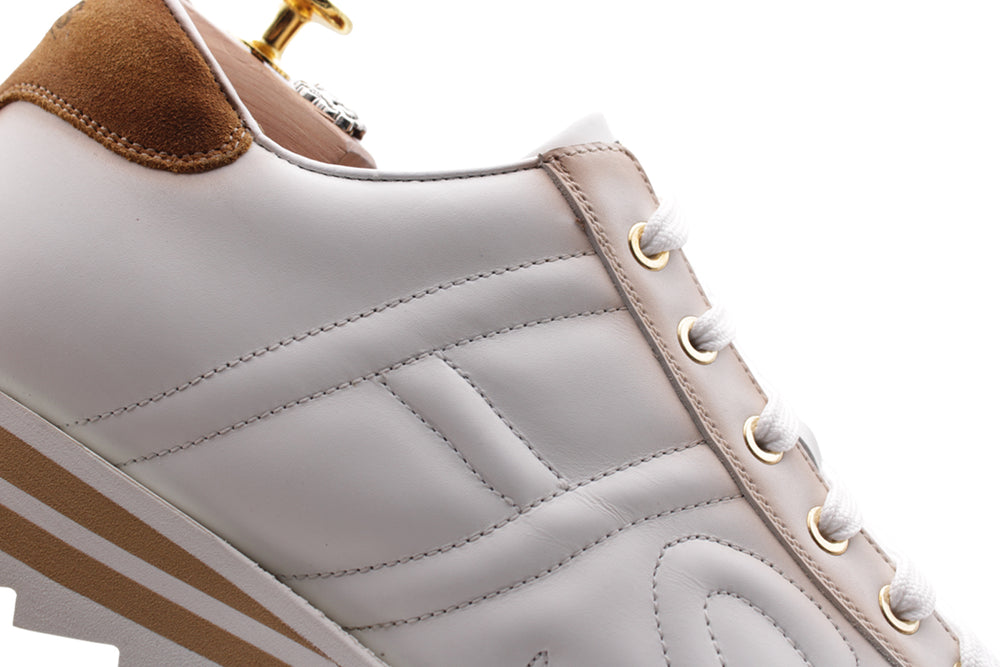 Sneakers in pelle con dettagli sfumati