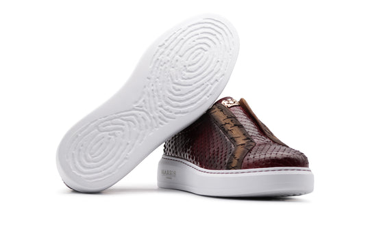 Sneaker slipon in pelle di pitone