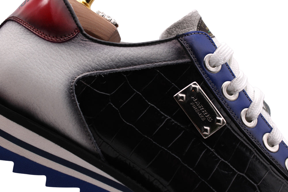 Sneakers effetto coccodrillo e dettagli sfumati