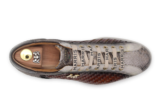 Sneakers in woven leather and python