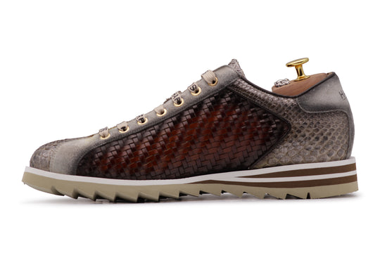 Sneakers in woven leather and python