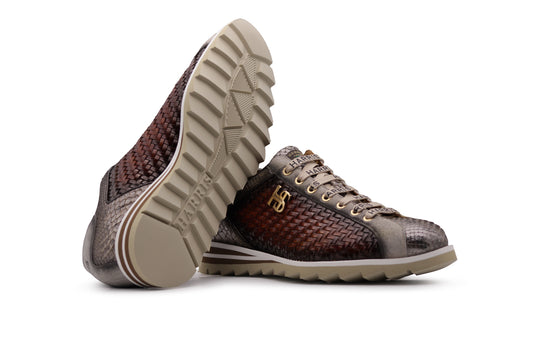 Sneakers in woven leather and python