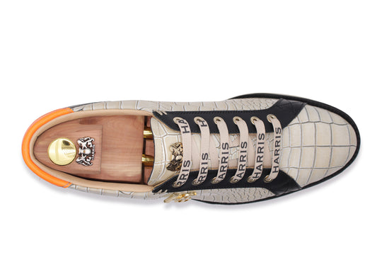 Sneaker en cuir dans l'impression crocodile